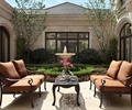 休闲桌椅,茶具,盆栽花卉,喷泉水池景观,灌木丛,庭院景观
